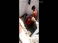 A lustful woman is shown getting banged and masturbated in a pornographic video.